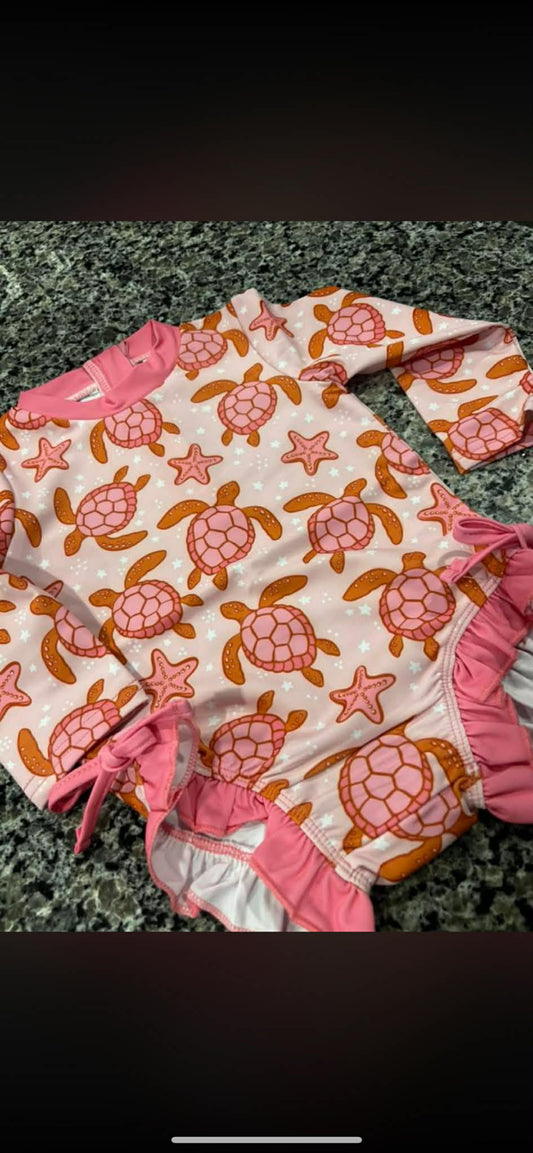 Pink Ruffled Sea Turtle Swim