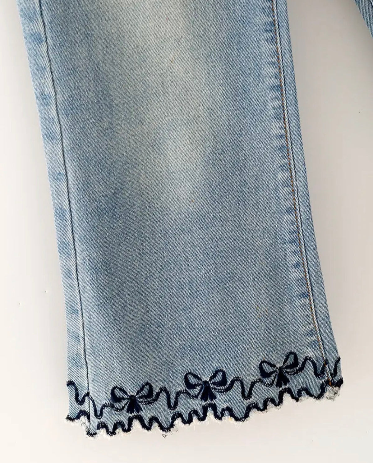 Embroidered Hem Denim Jeans￼